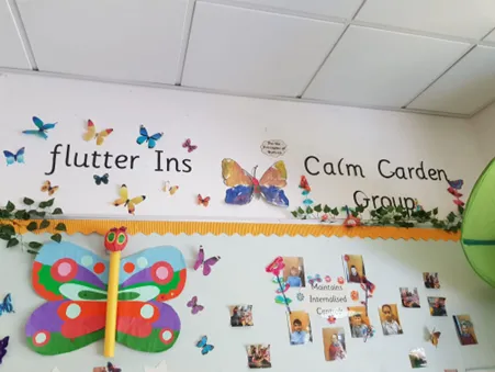 Photo of a colourful wall display in a Glasgow nursery setting