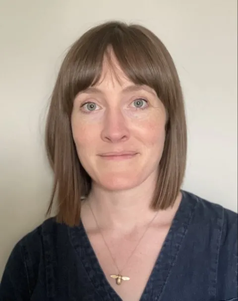 Woman with short brown hair