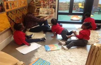 Teacher reading to children
