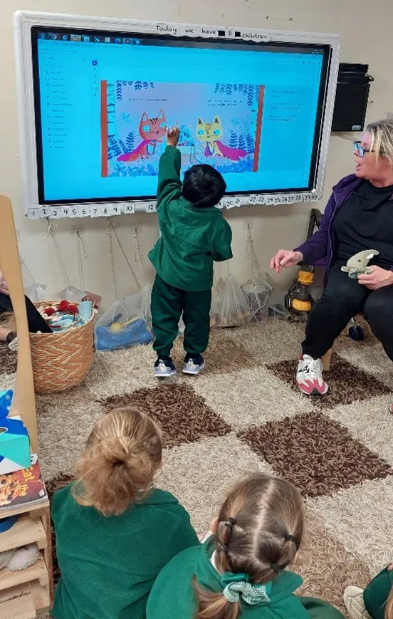 Child touching screen