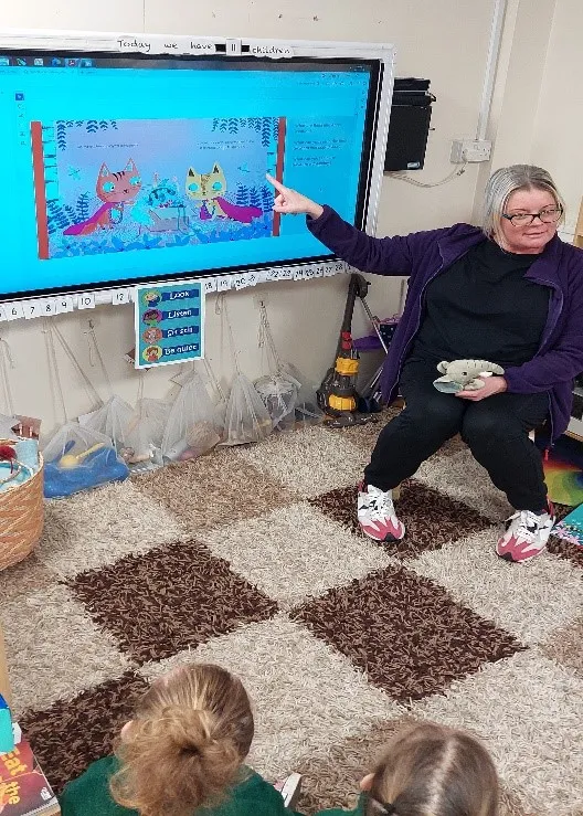 Teacher with children