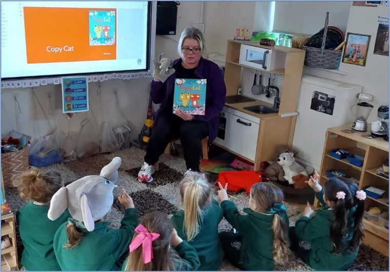 Teacher with children