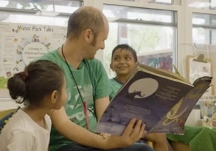 Early years children listening to a story