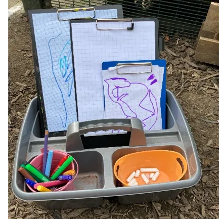 Caddy with crayons and clipboards