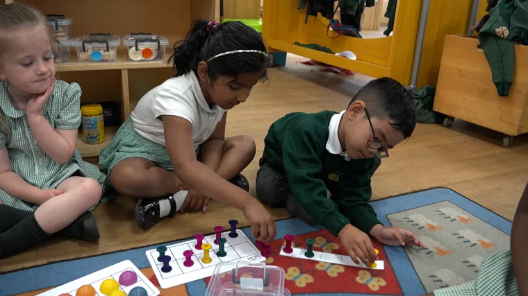 Photo of a group of children in a reception class taking part in a Counting Collections activity