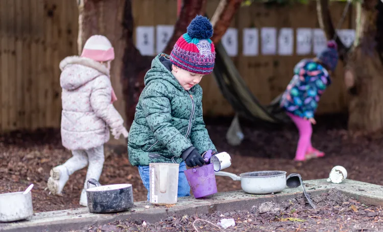 Early years children outside
