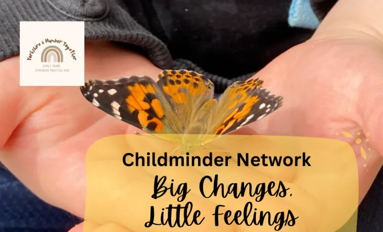 A child's hands holding an orange and black butterfly. 