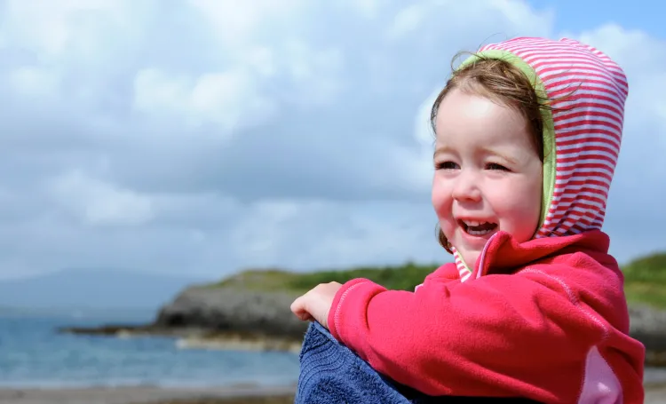 Child by the coast