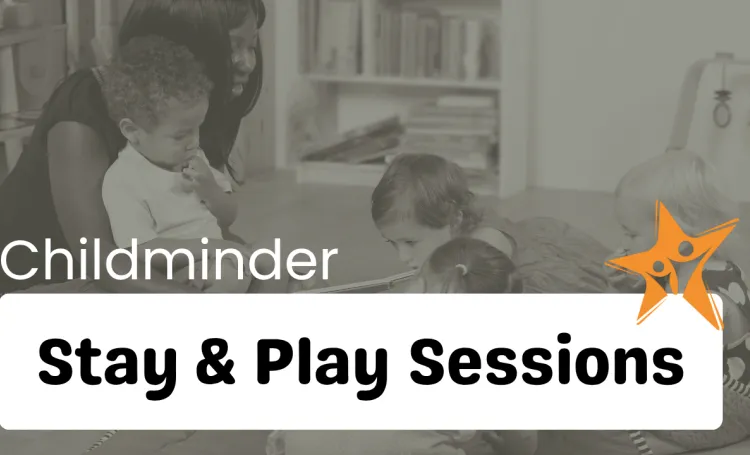 childminder sat reading to children