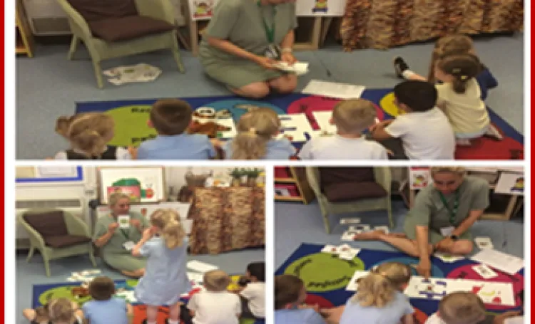 Children and teacher on floor