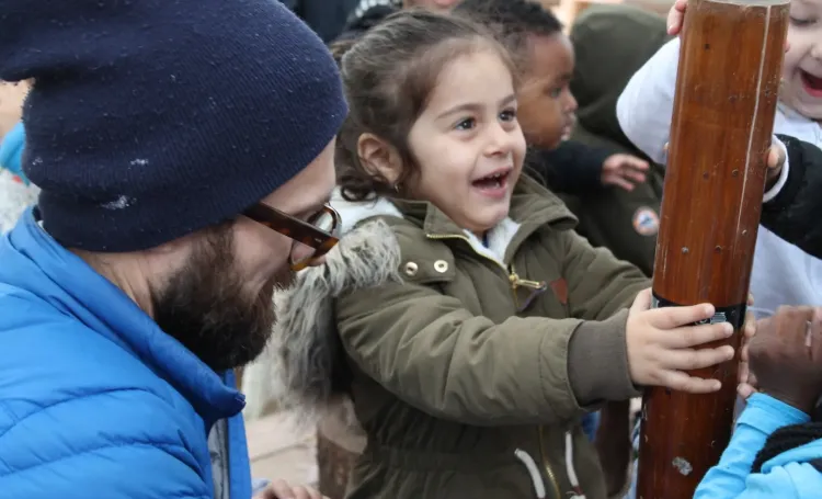 Early Years educator interacting with a child