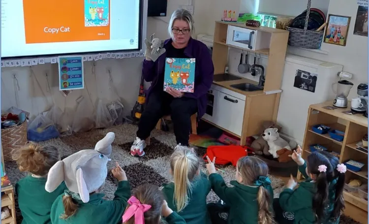 Teacher with children