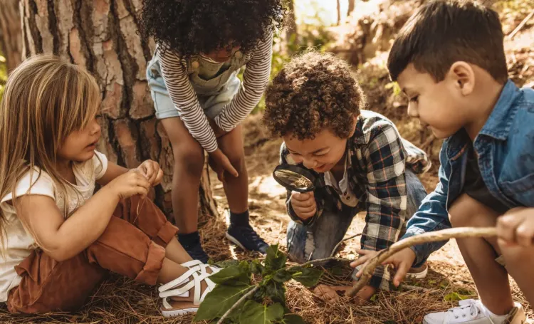 Diverse young children at a nursery setting playing together