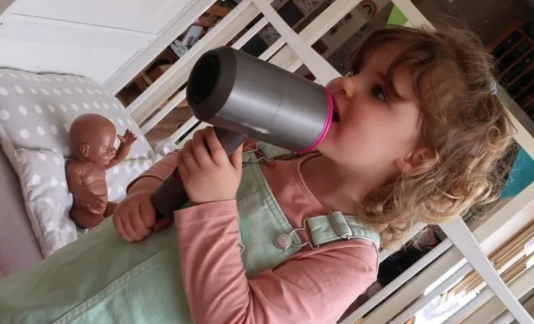 Hairdryer being used as a microphone