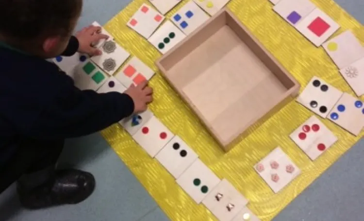 a child plays a simple maths game 