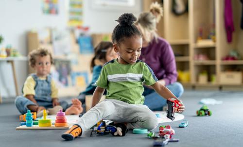 child playing with toys